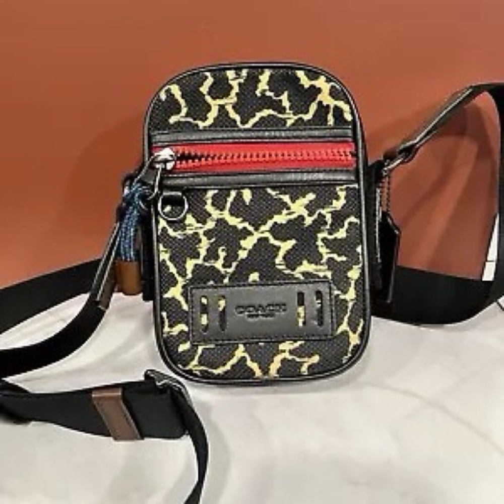 Coach small, animal print crossbody bag